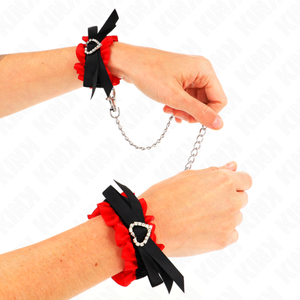 KINK – MUÑEQUERAS ELÁSTICAS DE ENCAJE CON DETALLE CORAZÓN ROJO AJUSTABLE 22-35 CM